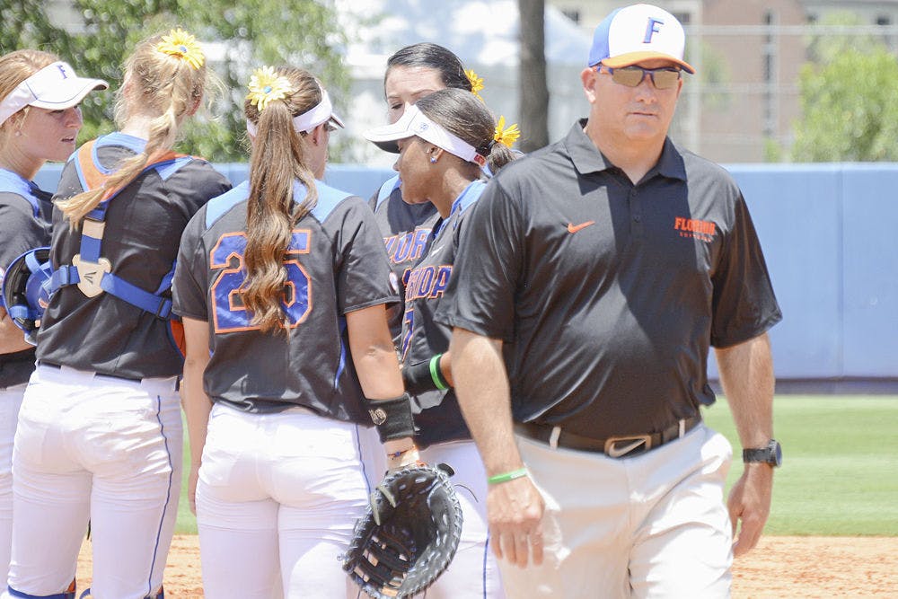 Coach Tim Walton walks back to the dugout during Florida's 1-0 win over Florida Atlantic on May 17, 2015, at Katie Seashole Pressly Stadium.