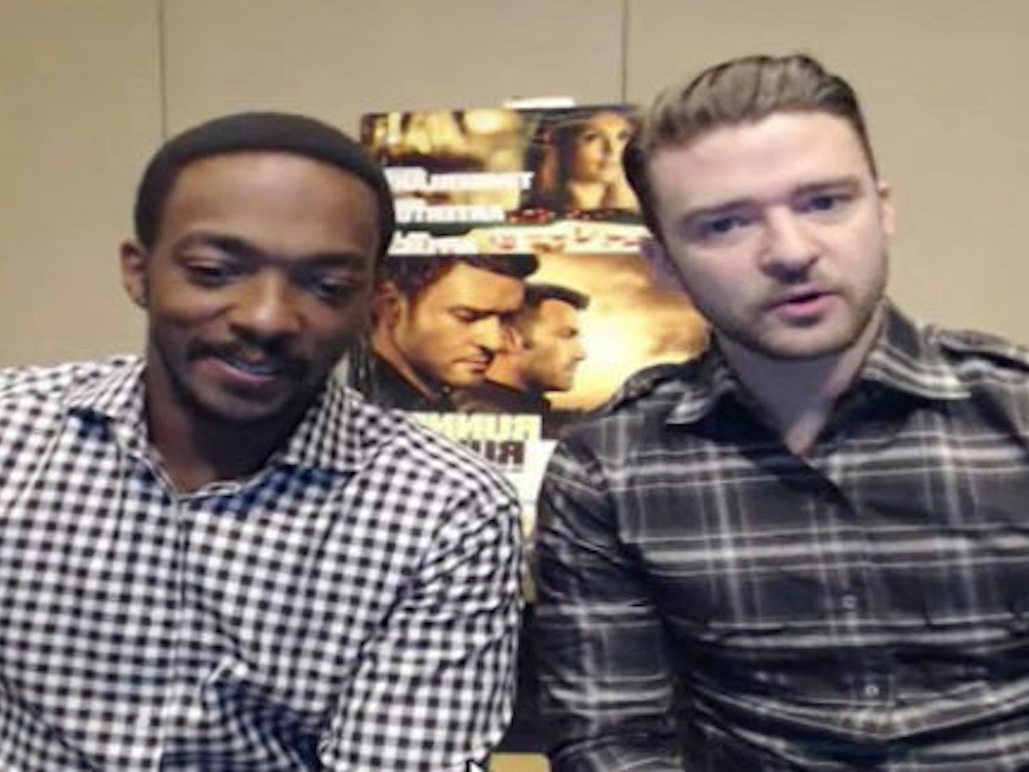 Justin Timberlake, right, and Anthony Mackie, left, speak with college students about the pair’s upcoming film “Runner, Runner” on Sept. 18 in a Google Hangout.