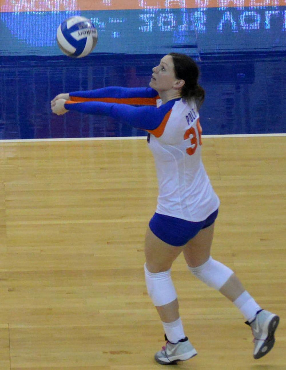 <p>Holly Pole records a dig during Florida's 3-2 loss to Florida State on Dec. 6 in the second round of the NCAA Tournament in the O'Connell Center. Pole has 527 career digs and 52 career service aces heading into the 2014 season — her senior year.</p>