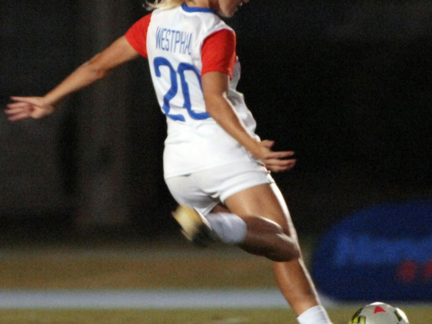 Christen Westphal (20) kicks the ball during Florida's 3-1 win against Tennessee on Friday at James G. Pressly Stadium.