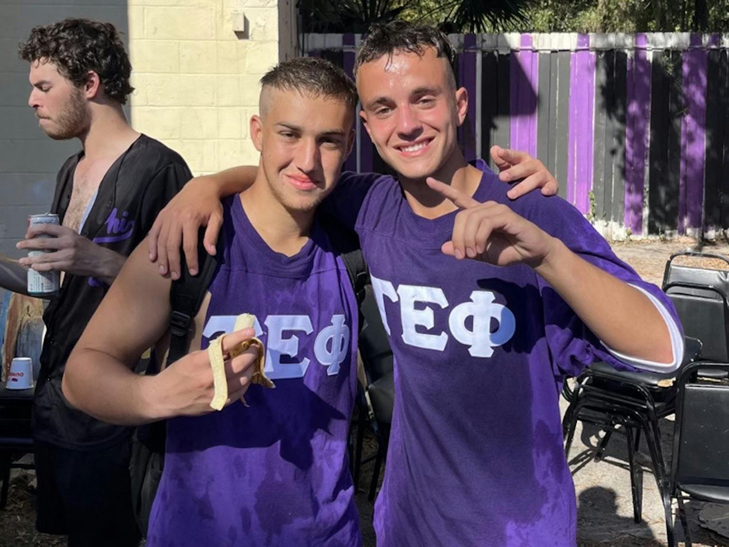 Eli Silverman (left) and Max Rappoport (right) stand together at the Nose Bowl, which is a flag football game between TEP and Pi Lam.