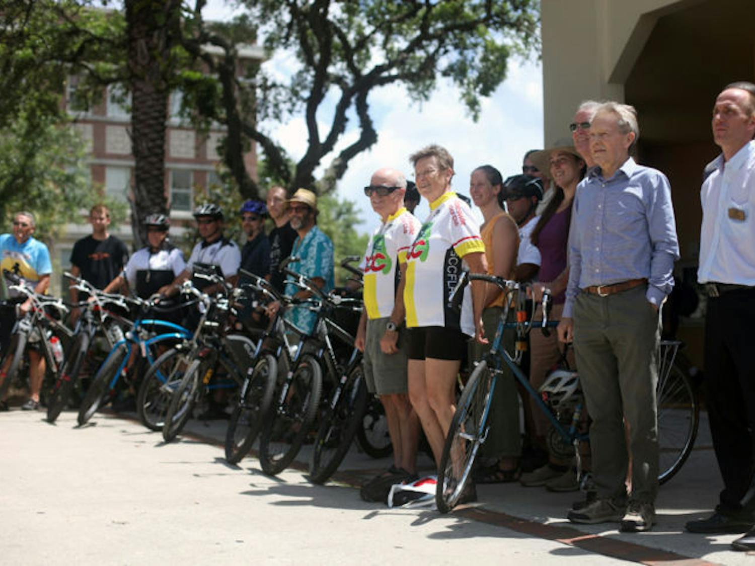 Participants in a closing event for National Bike Month gather in front of the Alachua County Library Headquarters Thursday.
&nbsp;