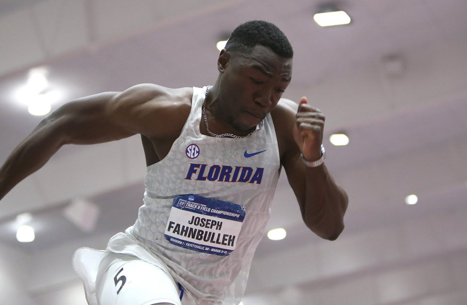 Florida&#x27;s Joseph Fahnbulleh competes during the third day at the NCAA Indoor Championships on Saturday, March 13, 2021 at Randal Tyson Track Center in Fayetteville, Ark. / UAA Communications photo by Rick Hurtado