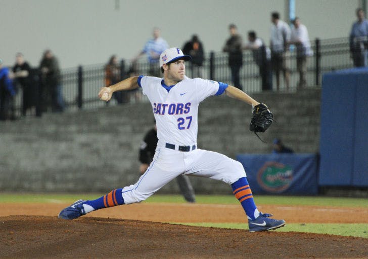 Aaron Rhodes pitches during Florida’s 3-1 win against Florida State on March 18 at McKethan Stadium.&nbsp;