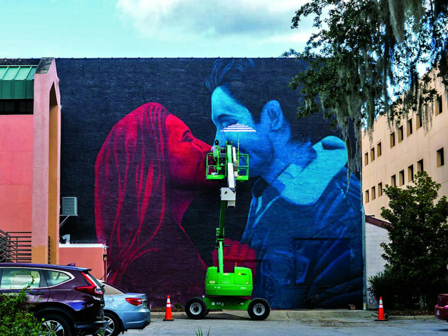 The 3D art mural at the wall behind the Florida Theatre on West University Avenue was revealed Sunday afternoon. It cost $10,000 to pay for the materials and the artist to fly in from Greece.