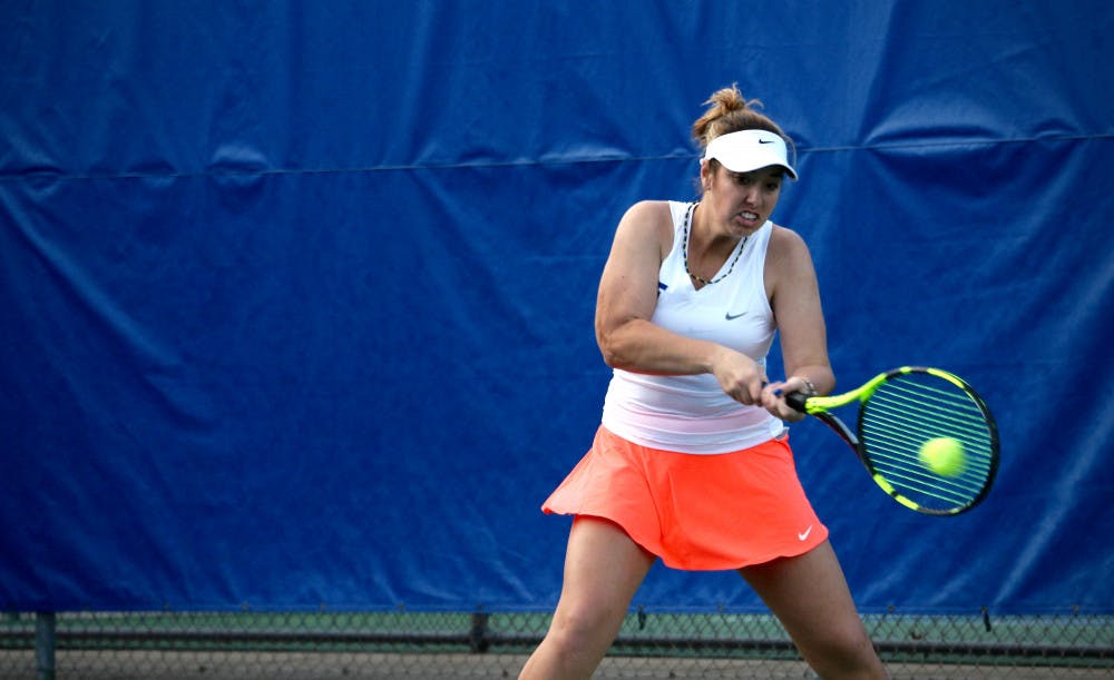 Brooke Austin hits a backhand during Florida's 4-2 win against Oklahoma State on Feb. 18, 2017, at the Ring Tennis Complex.