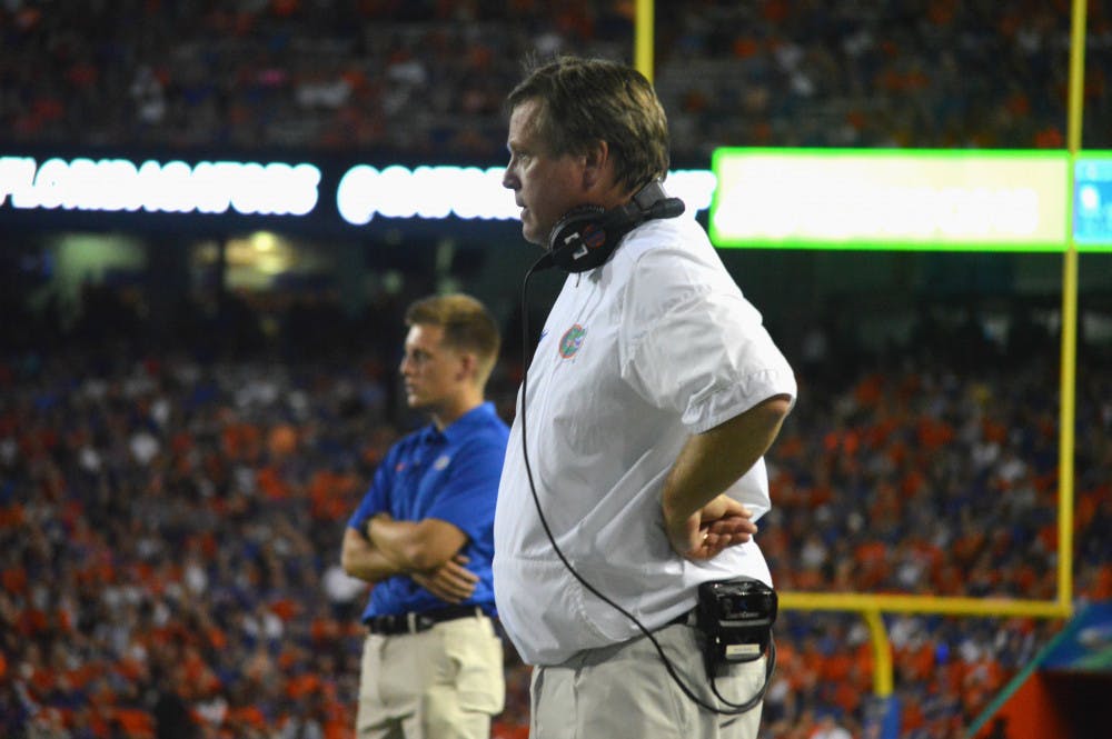 <p>UF coach Jim McElwain watches on during Florida's 19-17 loss against Texas A&amp;M on Saturday at Ben Hill Griffin Stadium.</p>