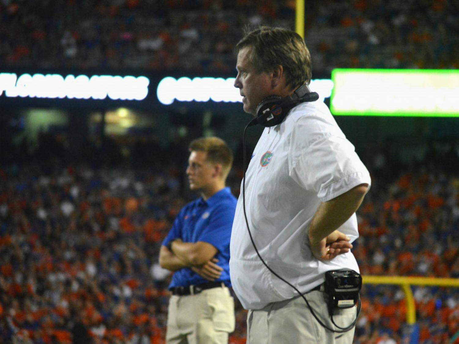 UF coach Jim McElwain watches on during Florida's 19-17 loss against Texas A&amp;M on Saturday at Ben Hill Griffin Stadium.