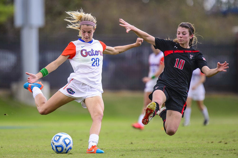 <p>Christen Westphal kicks the ball during Florida's 3-2 win against Texas Tech during the third round of the NCAA Tournament on Sunday at Donald R. Dizney Stadium.</p>
