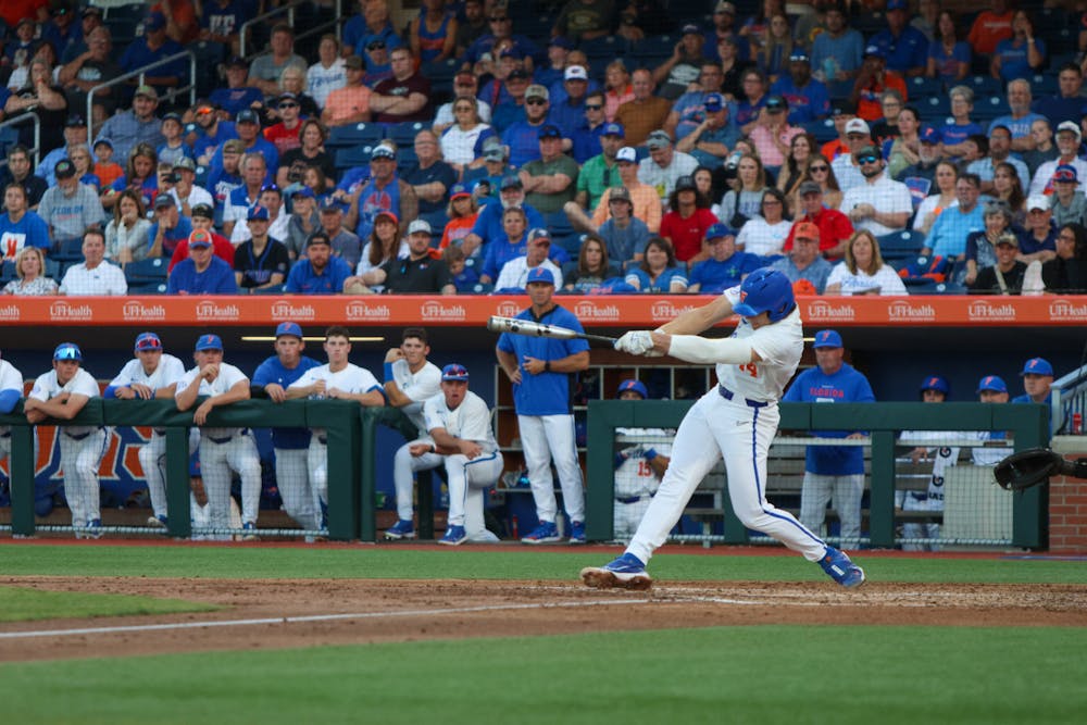 Florida two-way player Jac Caglianone hits the ball in the Gators' 13-11 loss to the Georgia Bulldogs Friday, April 14, 2023.