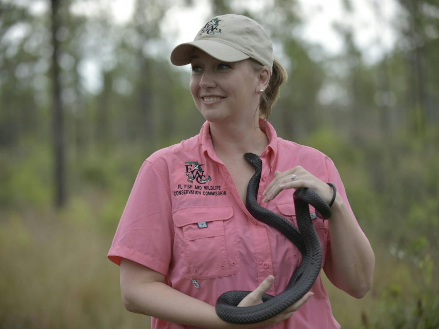 Brooke Talley waits to release Floyd at Apalachicola Bluffs and Ravines Preserve.