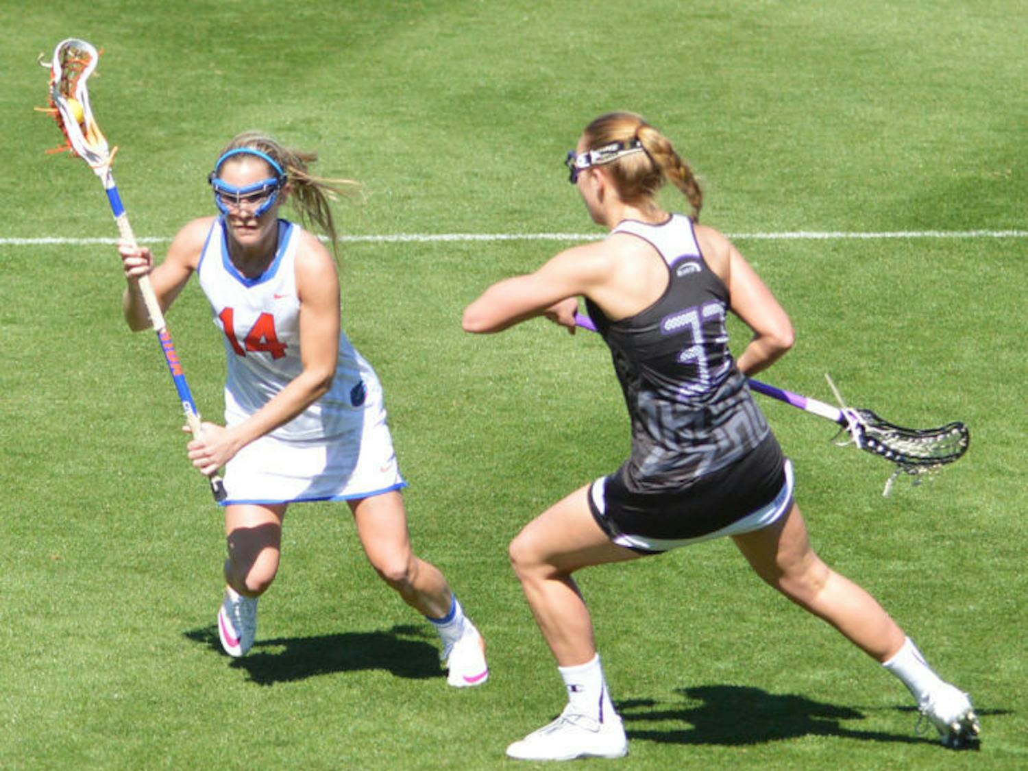 Nora Barry drives the ball toward the net during Florida’s 18-7 win against High Point on Feb. 15 at Donald R. Dizney Stadium. Barry scored the game-winning goal against Northwestern on Sunday to help the Gators clinch the American Lacrosse Conference Tournament title.
