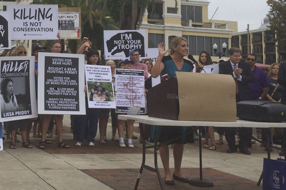 <p>Julie Watkin, the executive director of Jacksonville-based nonprofit The Girls Gone Green, spoke out against bear hunting in a rally she organized in downtown Orlando last month. The Florida Fish and Wildlife Commission's statewide hunt begins Saturday and will run through Sunday. Its goal is to harvest 320 bears to manage the population.</p>
