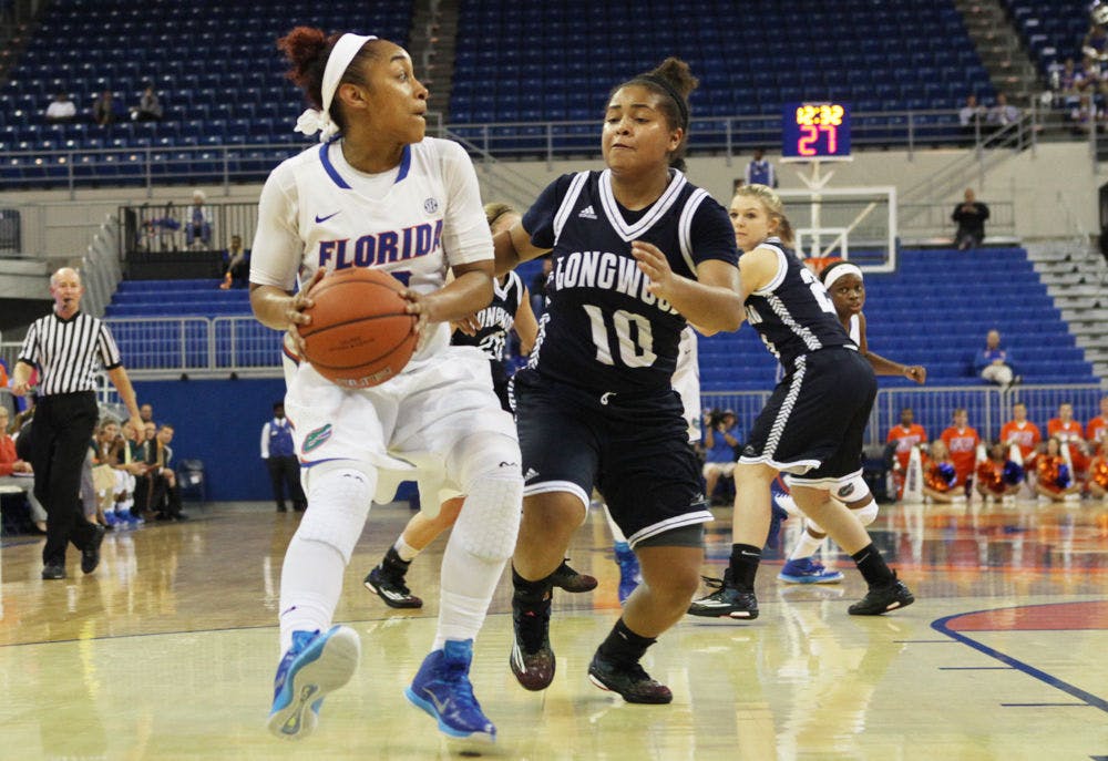 <p>Cassie Peoples drives into the paint during Florida's win against Longwood.</p>