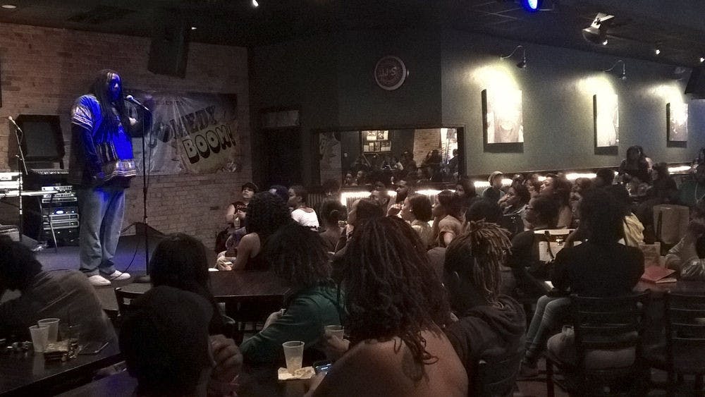 <p>Huggy Bear Da Poet, a spoken word artist, performs at Rockeys Dueling Piano Bar during the “Black Euphoria” open mic night on Tuesday.</p>