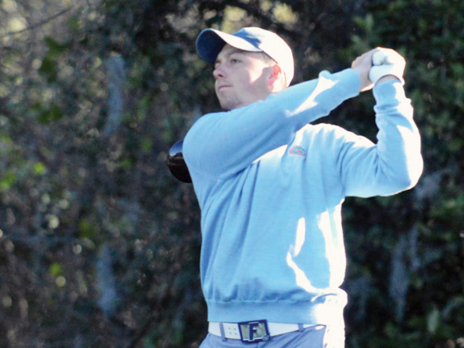 J.D. Tomlinson tees off during Day 2 of the SunTrust Gator Invitational on Feb. 16 at the Mark Bostick Golf Course.
