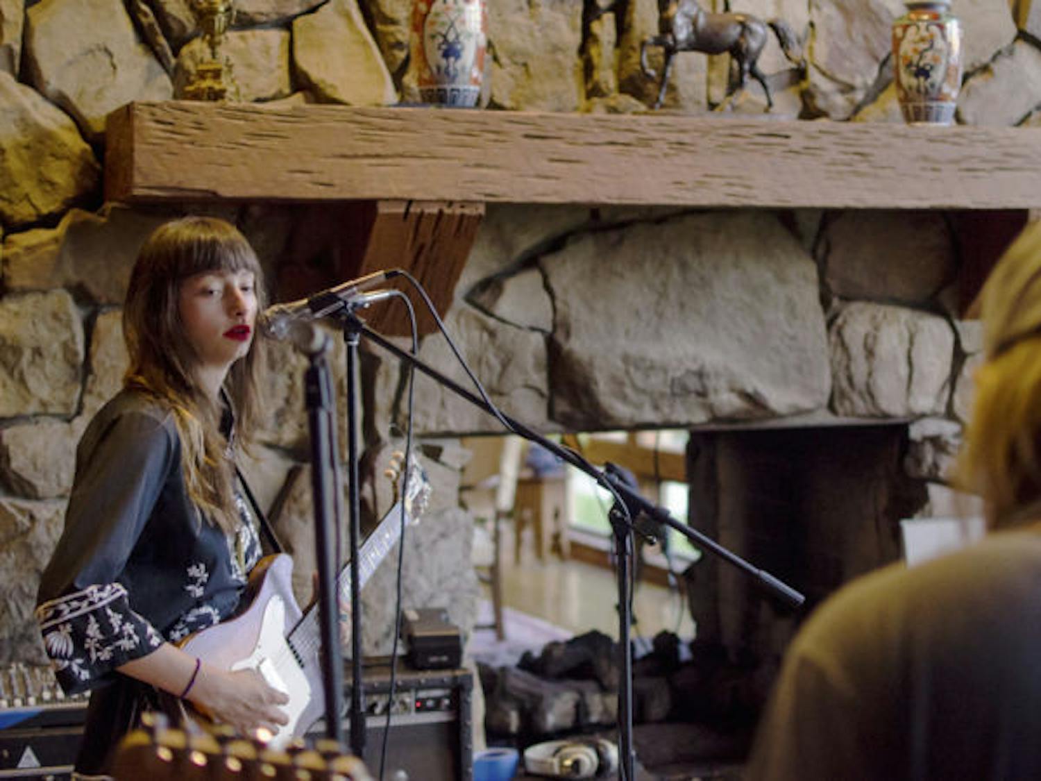 Victoria de Benedicty, 18, and Dalton Jacob, 24, practice at Victoria’s house in Ocala on Tuesday. Their band III BONES will perform its last show at the High Dive on Saturday before moving out to Austin, Texas.

