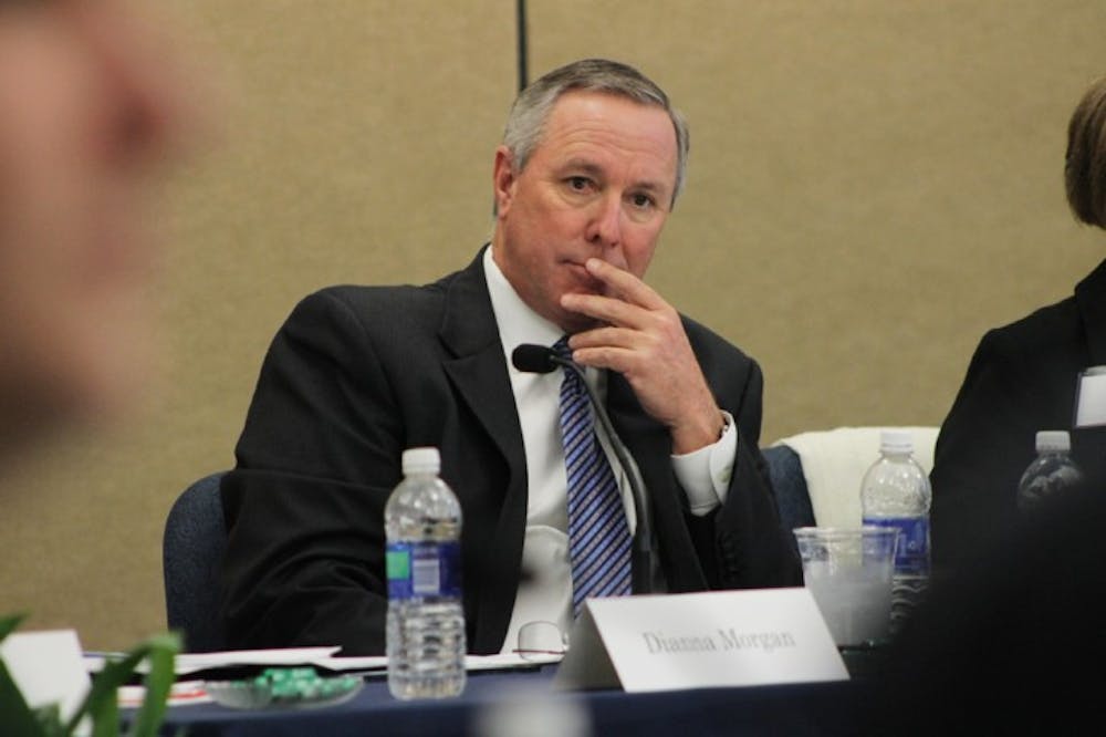 <p>UF Board of Trustees chairman David Brown discusses criteria for presidential candidates during a board meeting Tuesday.</p>