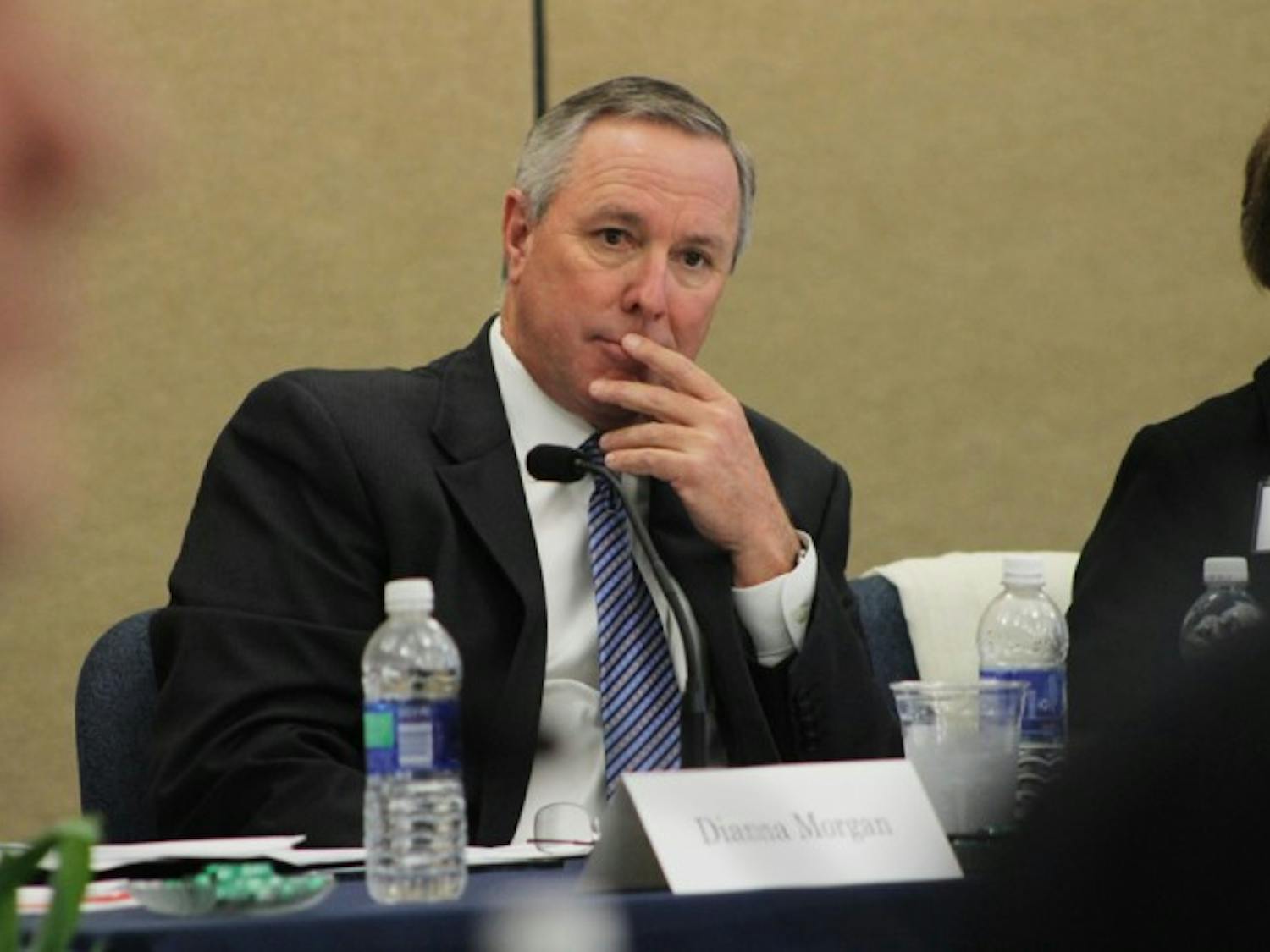 UF Board of Trustees chairman David Brown discusses criteria for presidential candidates during a board meeting Tuesday.