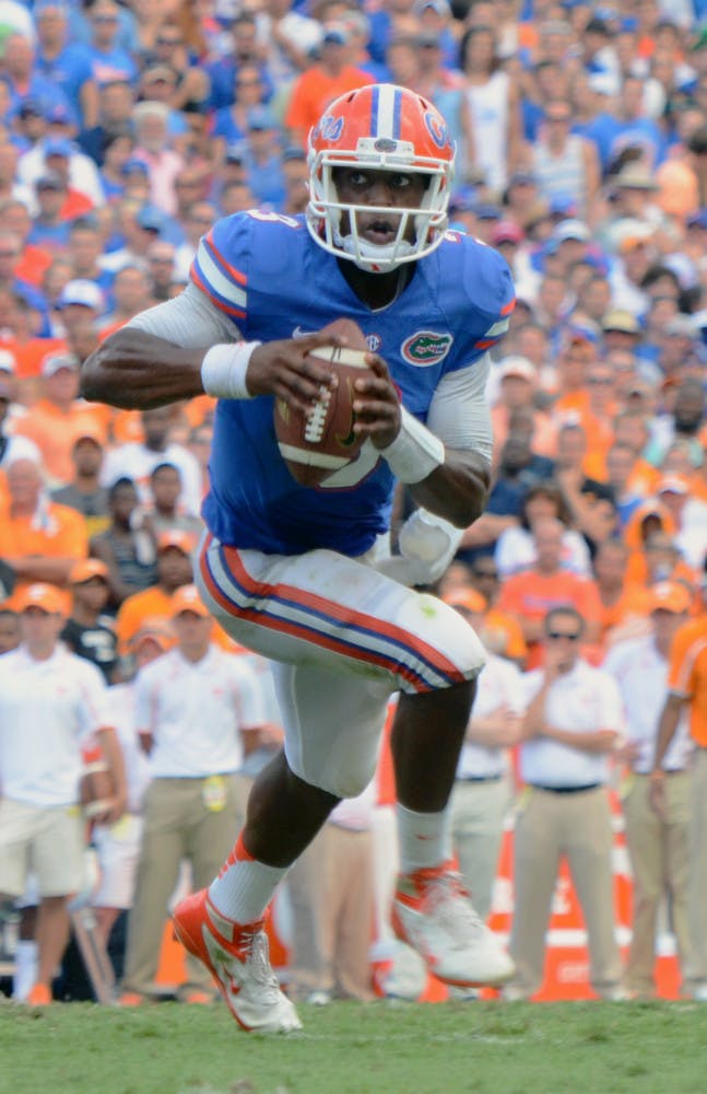Tyler Murphy runs the ball during Florida’s 31-17 victory against Tennessee on Sept. 21 in Ben Hill Griffin Stadium.