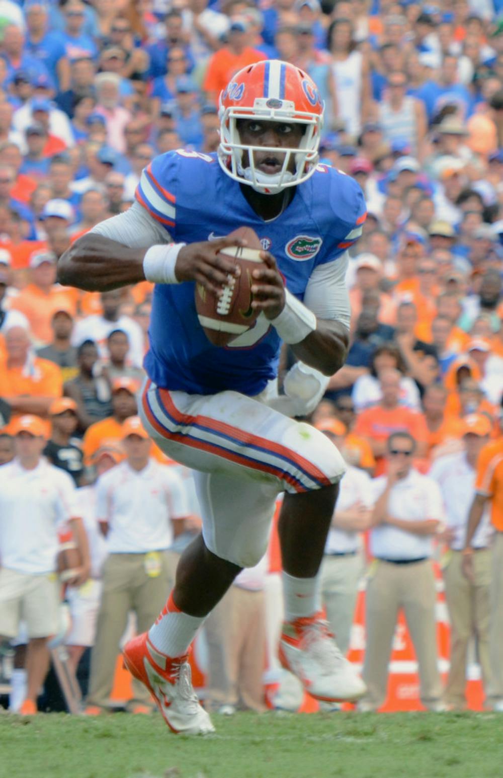 <p>Tyler Murphy runs the ball during Florida’s 31-17 victory against Tennessee on Sept. 21 in Ben Hill Griffin Stadium.</p>