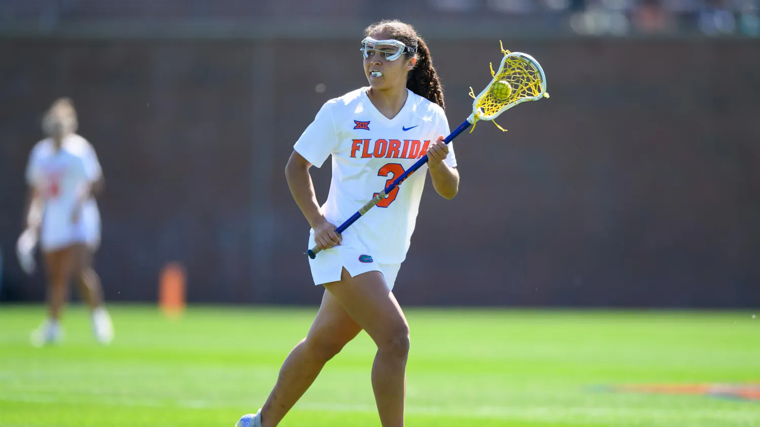 Florida attacker Autumn Blair (3) runs during the first half of an NCAA lacrosse match against Michigan, Friday, Feb. 13, 2026, in Gainesville, Fla.