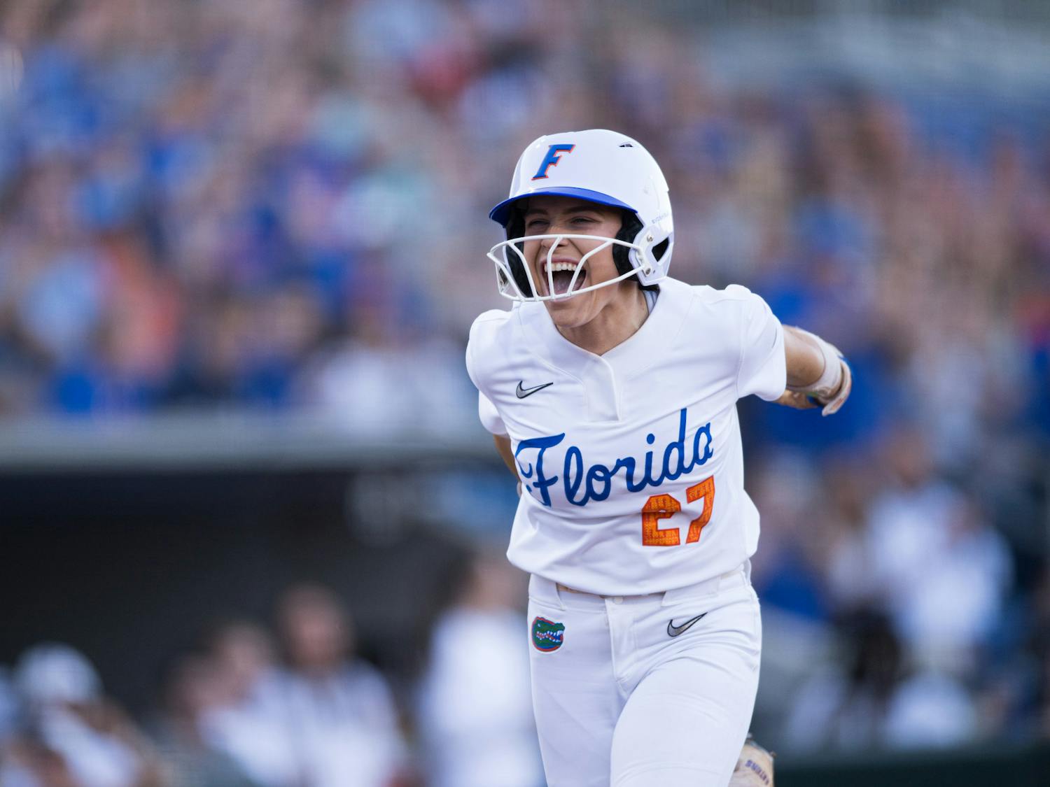 Florida Gators outfielder Kendra Falby (27) celebrates as she arrives to home plate after her second home run of the season during a softball game against UCF in Gainesville, Fla., on Wednesday, March 12, 2025.
