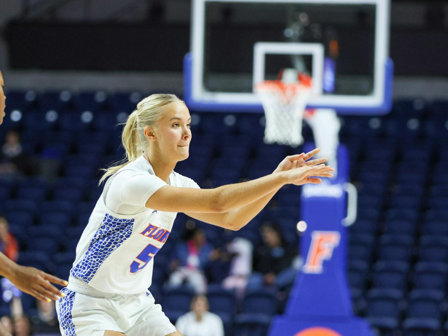 Sophomore guard Alberte Rimdal dishes a pass during Florida's game against Bethune-Cookman Friday Nov. 18, 2022. Rimdal was one of three Gators to score double-digits against Presbyterian Tuesday night.  