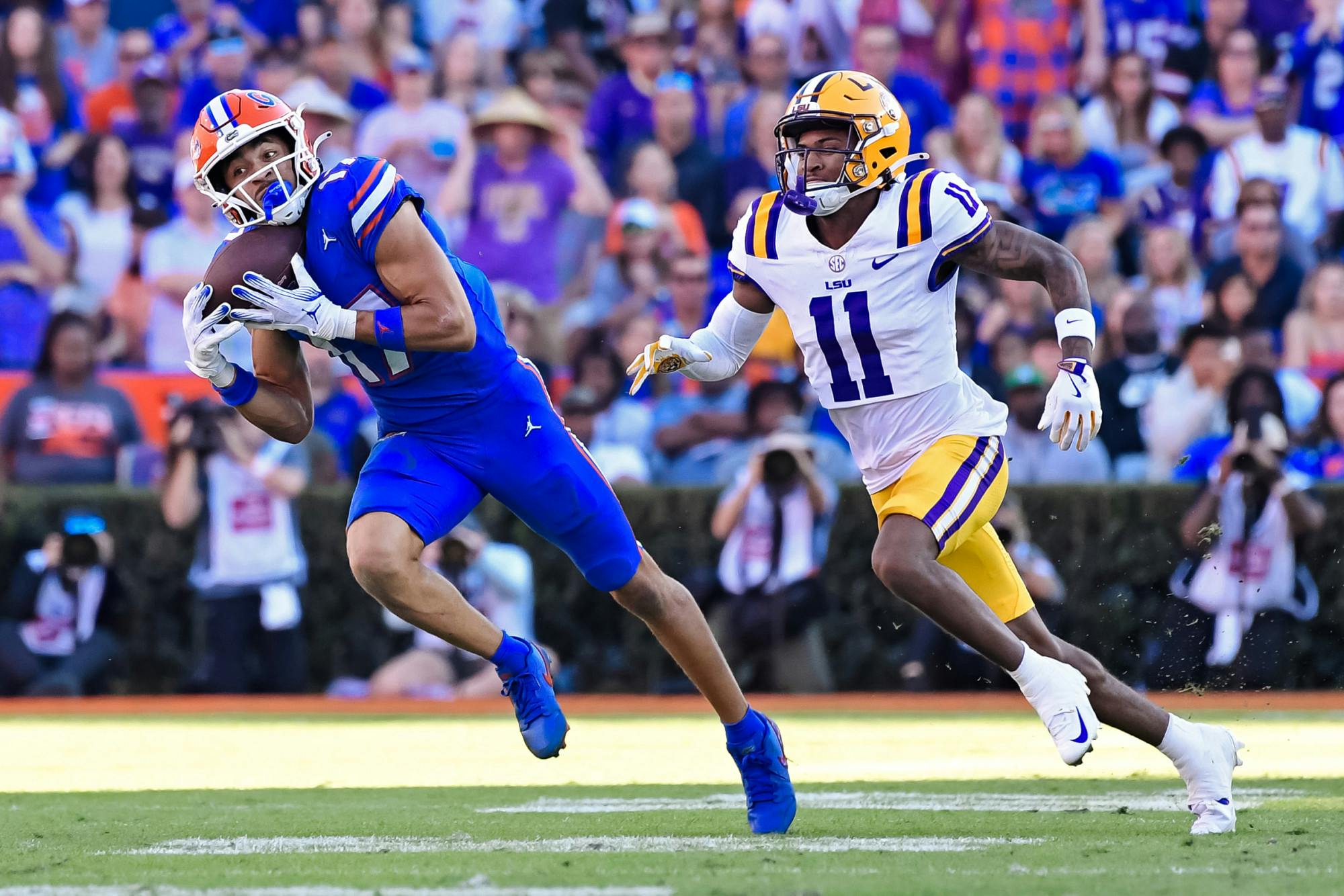 Chimere Dike (17) makes a catch during the first quarter against the Lousiana State Tigers at Ben Hill Griffin Stadium on Saturday, Nov. 16, 2024.