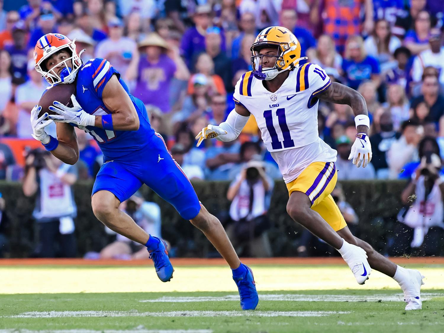 Chimere Dike (17) makes a catch during the first quarter against the Lousiana State Tigers at Ben Hill Griffin Stadium on Saturday, Nov. 16, 2024.