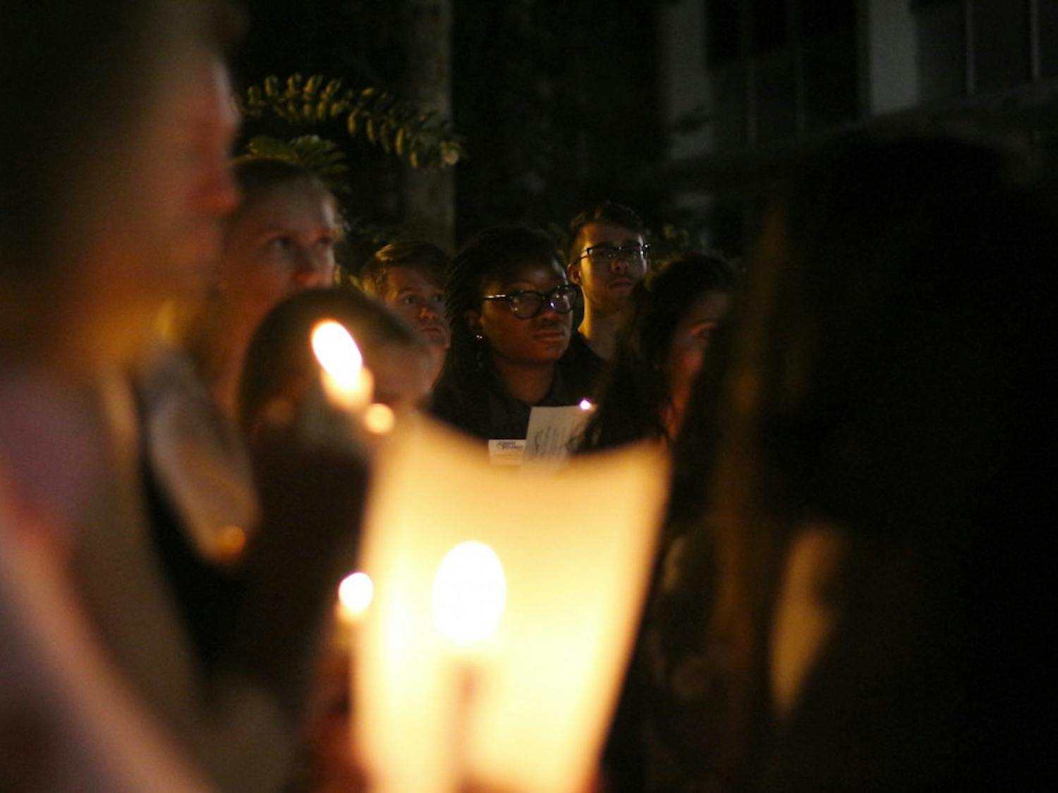 Ashley St. Charles, a 20-year-old political science and international studies junior, stands surrounded by her fellow Campus Diplomats as they remember former member Abby Dougherty. “All I can remember was just her laughing and smiling,” St. Charles said of the last memory she has of Dougherty.