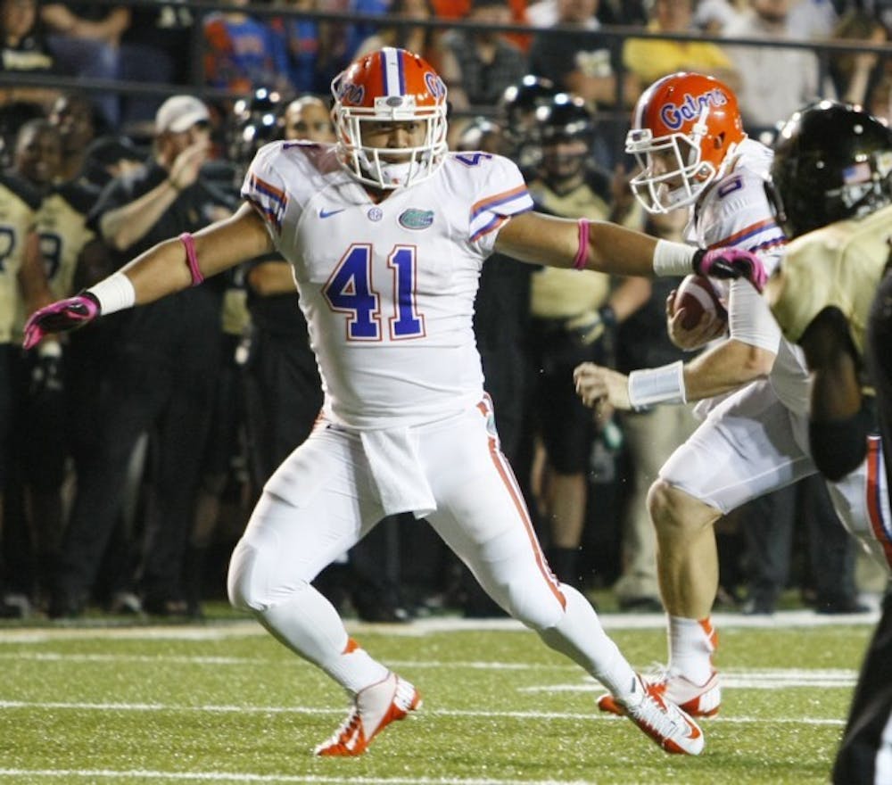 <p>Sophomore fullback Hunter Joyer (41) blocks for quarterback Jeff Driskel (6) during Florida’s 31-17 victory against Vanderbilt on Saturday at Vanderbilt Stadium in Nashville, Tenn. Joyer has been the unsung hero in a much improved UF rushing attack.</p>