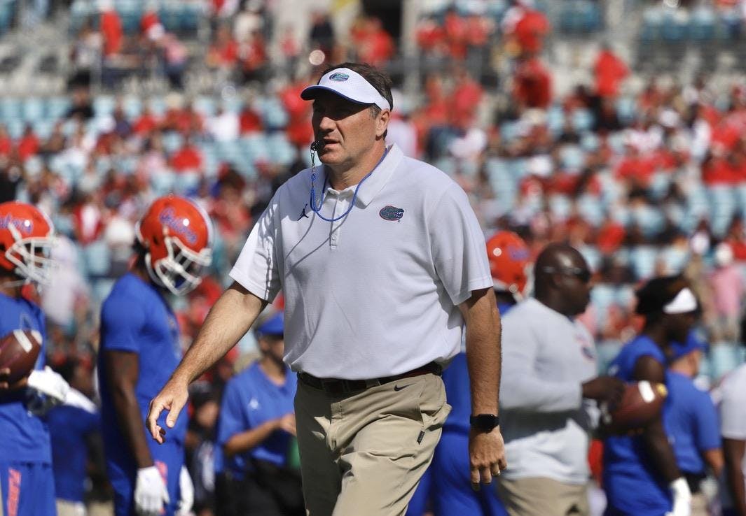 Former Florida head coach Dan Mullen during warmups at TIAA Bank Field in Jacksonville on Oct. 30, 2021.