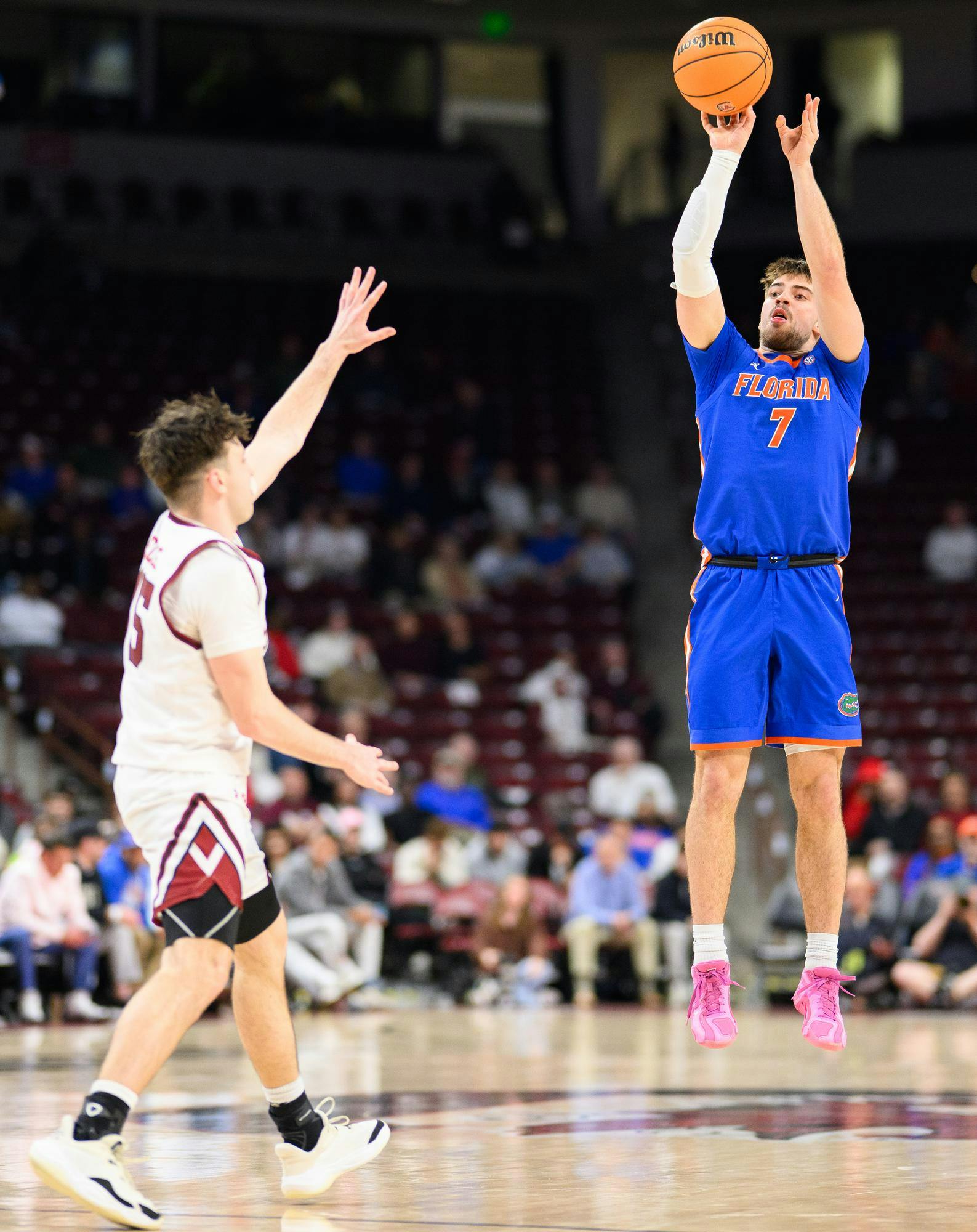 Florida guard Urban Klavzar (7) shoots a three during the second half of an NCAA college basketball game against South Carolina, Wednesday, Jan. 28, 2026, in Columbia, S.C.