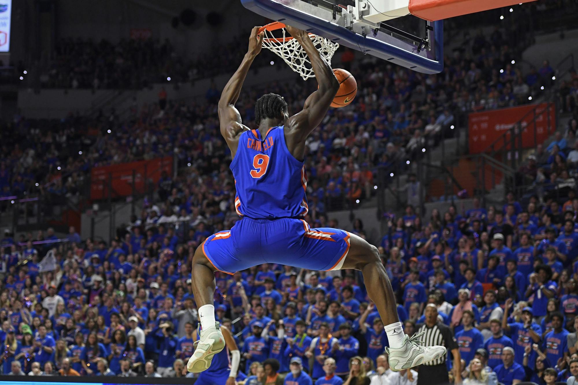 UF basketball player Rueben Chinyelu (9) dunks the ball during the game against the Texas Longhorns on Saturday, January 18, 2025, at the O’Connell Center in Gainesville, Florida.