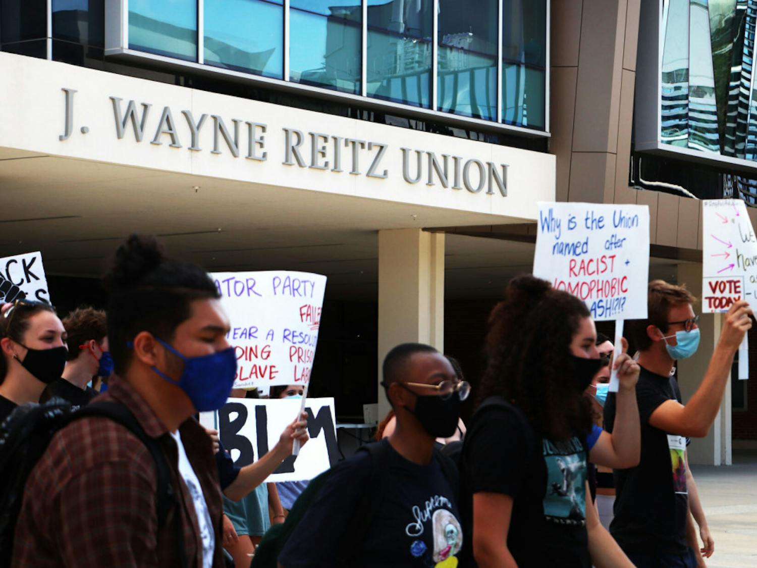Protesters are seen walking from the Reitz Student Union towards Tigert Hall on Tuesday, Oct. 6, 2020.&nbsp;
