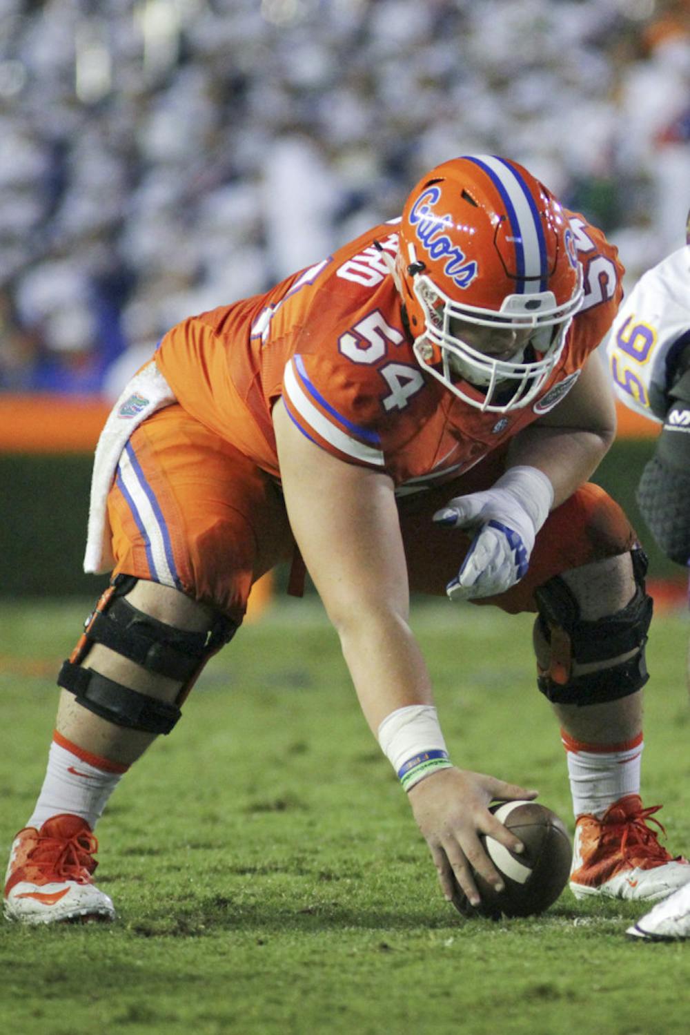 <p>UF offensive lineman Cam Dillard prepares to snap the football during Florida's 31-24 win against East Carolina on Sept. 12, 2015, at Ben Hill Griffin Stadium.</p>