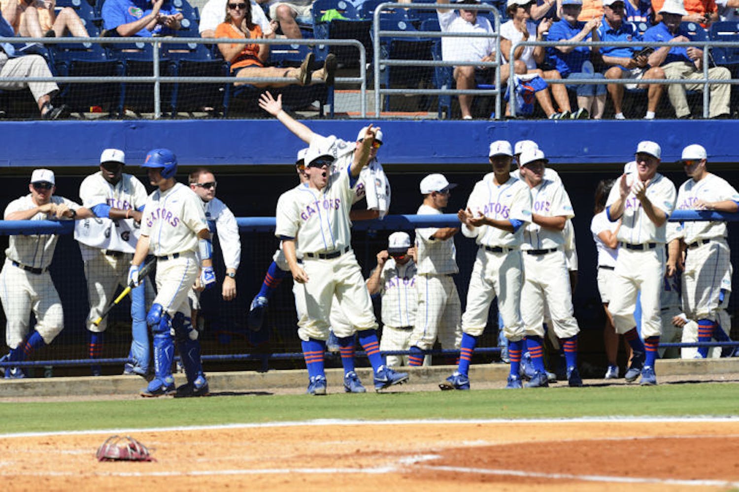 Florida players celebrate during a 14-5 victory against South Carolina on Saturday at McKethan Stadium. The victory sealed the Gators' series sweep against the Gamecocks.