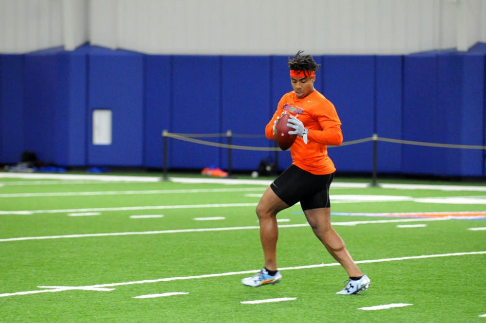 All-America cornerback Vernon Hargreaves III catches a pass during a drill as part of Florida's Pro Day on Tuesday inside UF's indoor practice facility.