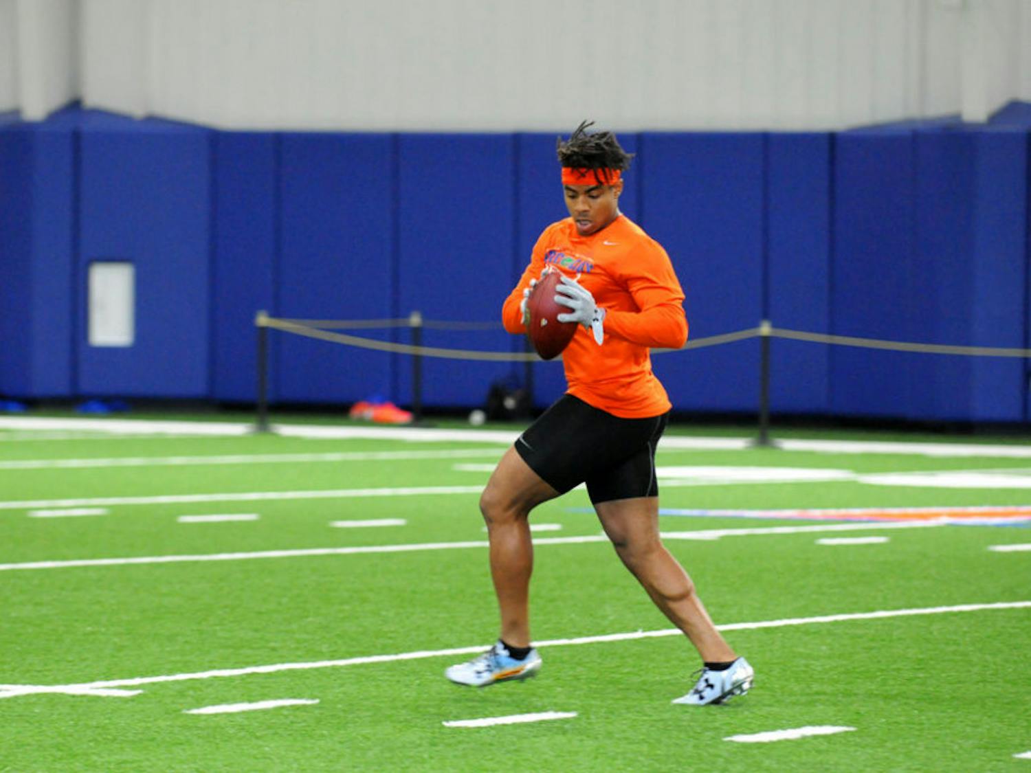 All-America cornerback Vernon Hargreaves III catches a pass during a drill as part of Florida's Pro Day on Tuesday inside UF's indoor practice facility.