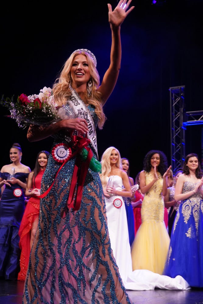 Nicolette Jennings, a 22-year-old UF telecommunication alumnus and former president of UF’s Gamma Iota chapter of Zeta Tau Alpha, waves after being crowned the 2019 Miss Florida USA.  