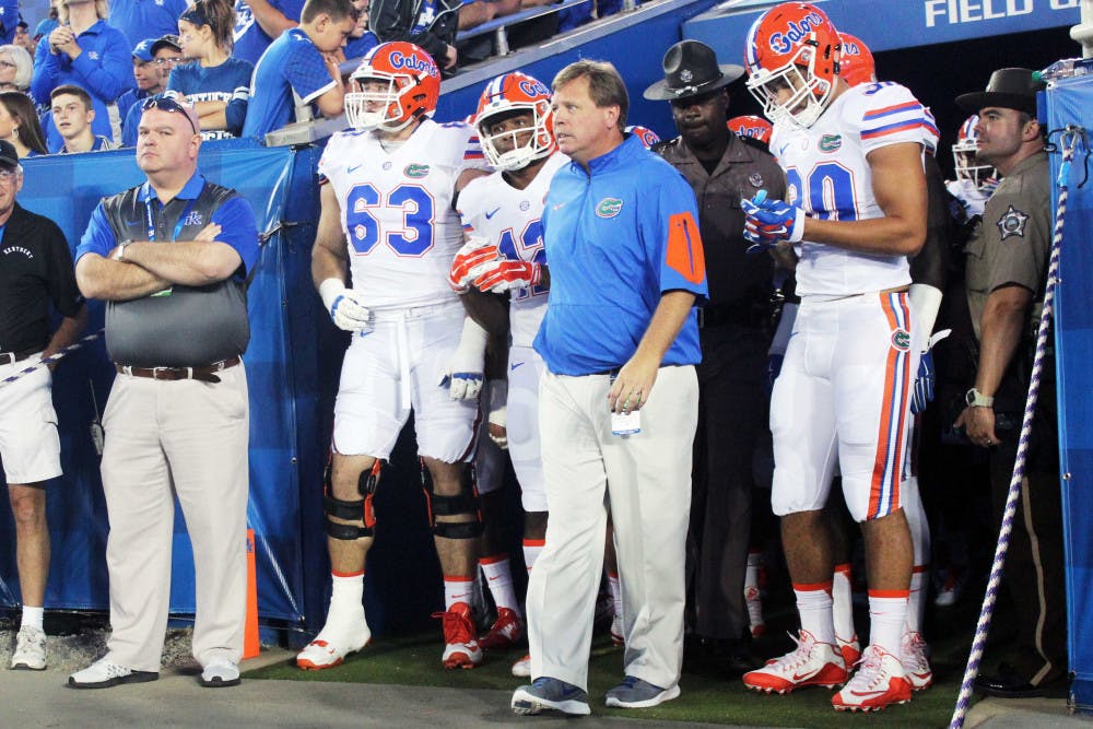 <p>UF football coach Jim McElwain walks out of the visitor's tunnel prior to Florida's 14-9 win against Kentucky on Sept. 19, 2015, at Commonwealth Stadium in Lexington, Kentucky.</p>