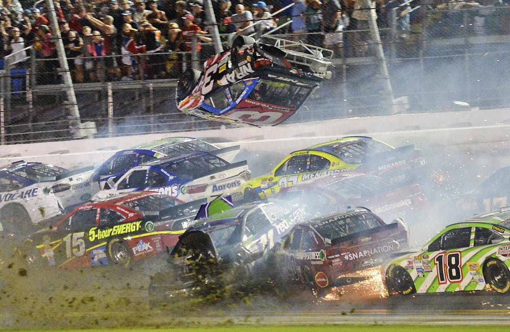 Austin Dillon (3) goes airborne as he was involved in a multi-car crash on the final lap of the NASCAR Sprint Cup series auto race at Daytona International Speedway in Daytona Beach, Florida.
