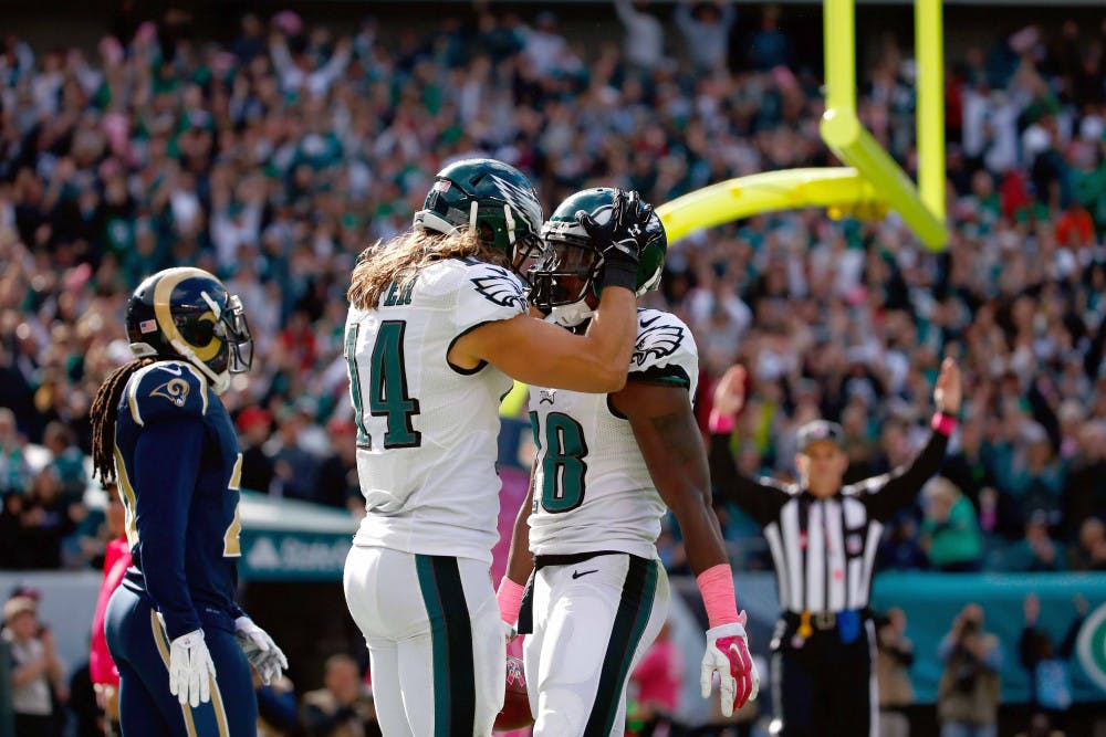 <p>Philadelphia Eagles' Jeremy Maclin, right, and Riley Cooper celebrate after Maclin's touchdown during the second half of an NFL football game against the St. Louis Rams, Sunday, Oct. 5, 2014, in Philadelphia.</p>