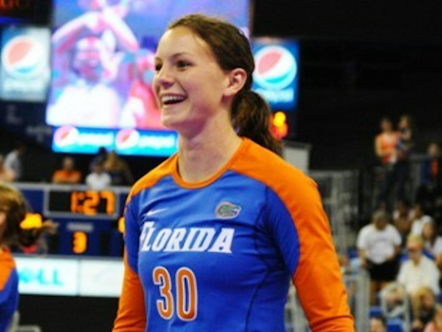 Florida sophomore defensive specialist Holly Pole celebrates during a match in 2011.
