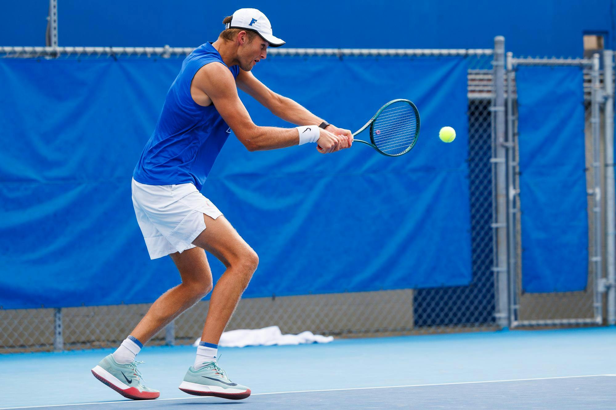 Florida tennis player Henry Jefferson returns a serve during an NCAA tennis match against Vanderbilt, Thursday, April 2, 2026, in Gainesville, Fla.