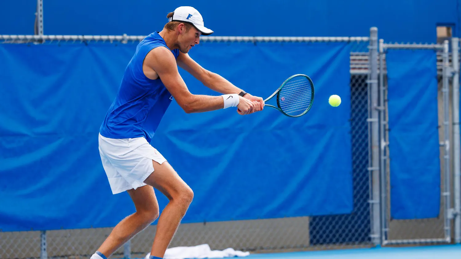 Florida tennis player Henry Jefferson returns a serve during an NCAA tennis match against Vanderbilt, Thursday, April 2, 2026, in Gainesville, Fla.