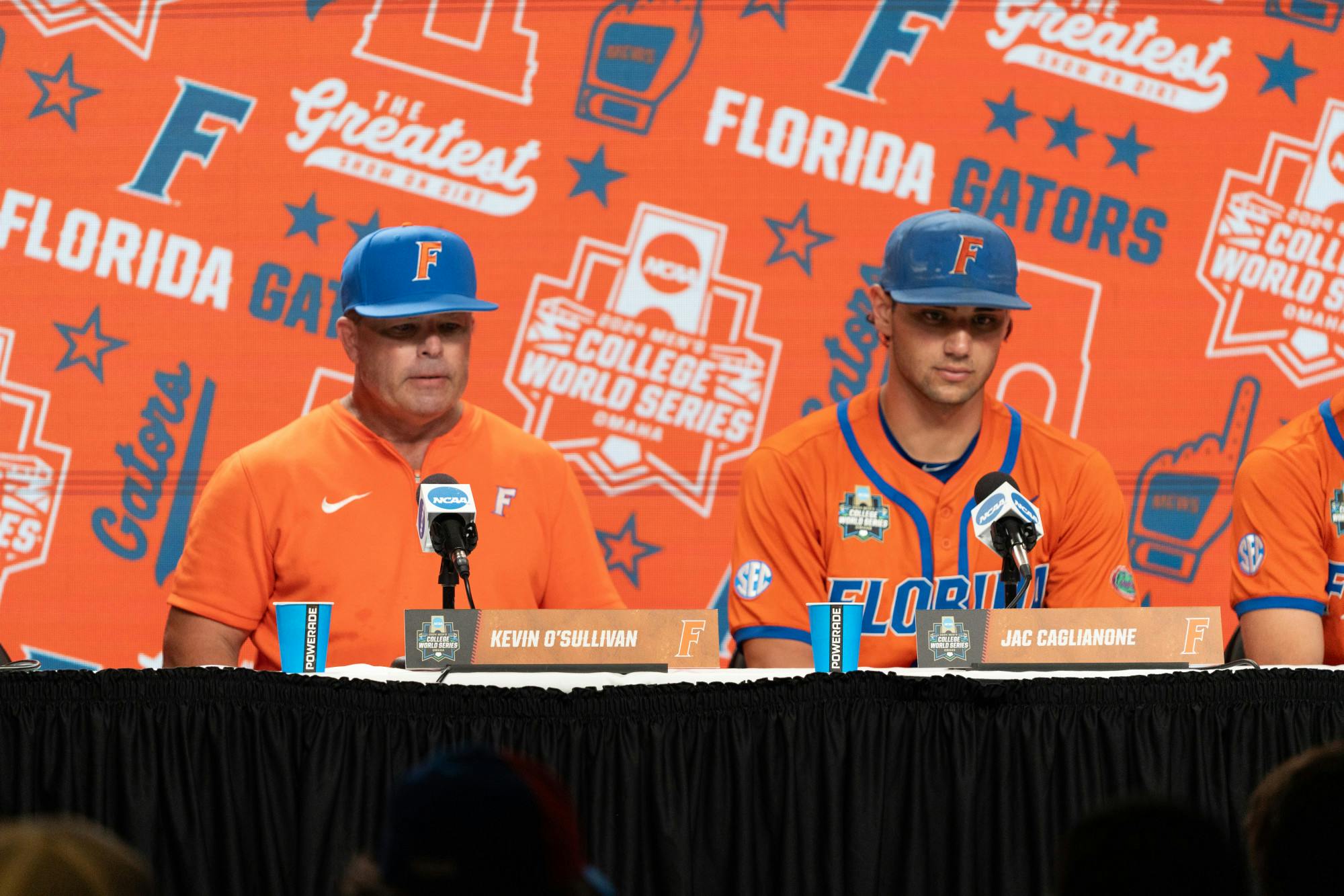 Florida baseball head coach Kevin O&#x27;Sullivan sits with two-way star Jac Caglianone following the Gators’ 5-4 win against the North Carolina State Wolfpack at the College World Series in Omaha, Nebraska on Monday, June 17, 2024.