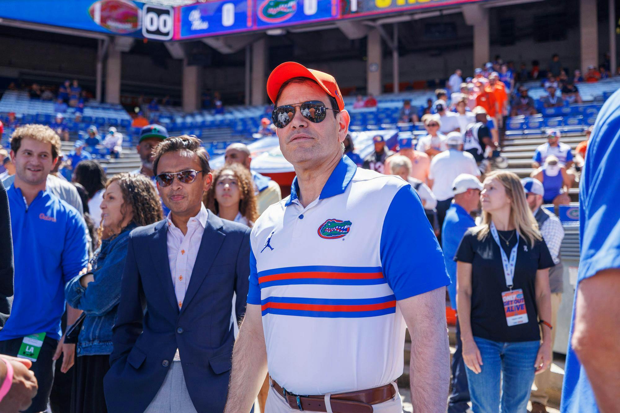 Secretary of State Marco Rubio stands on the field before an NCAA college football game against Ole Miss, Saturday, Sept. 26, 2026, in Gainesville, Fla.