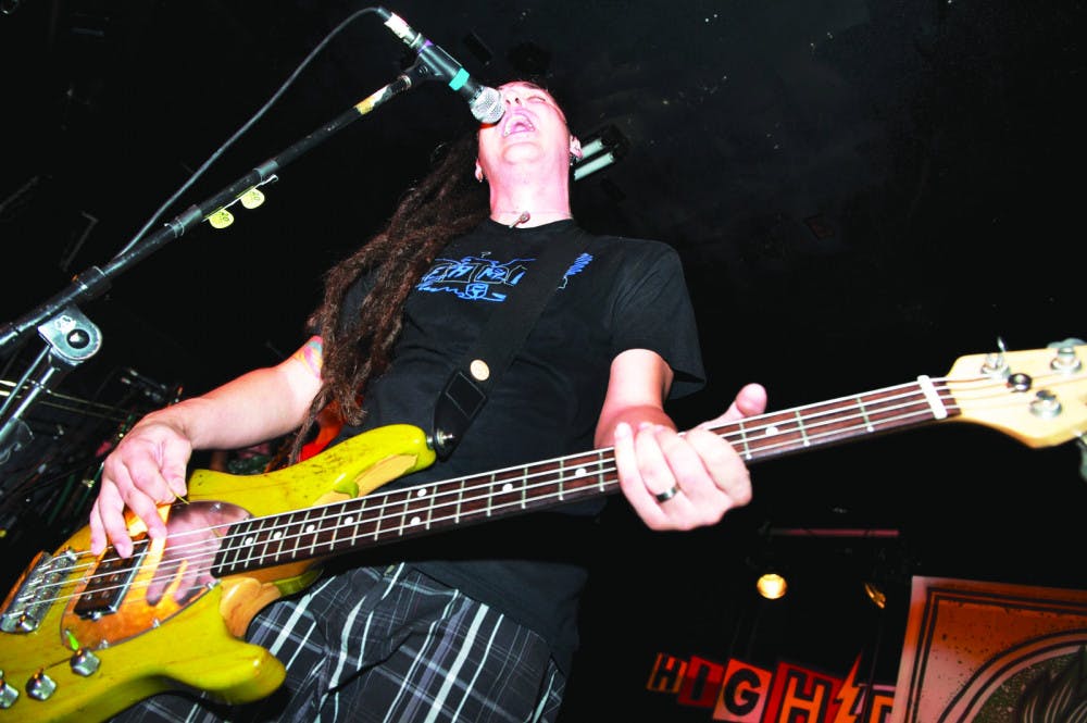 Less Than Jake vocalist and bassist Roger Manganelli plays at the High Dive during the band’s Wake and Bake event in 2012. The band will perform t at the High Dive Aug. 30-Aug. 31.